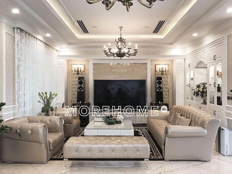 Kết hợp với mảng tường lớn để tivi và giàn loa đài được ốp da tạo sự sang trọng cho căn phòng
